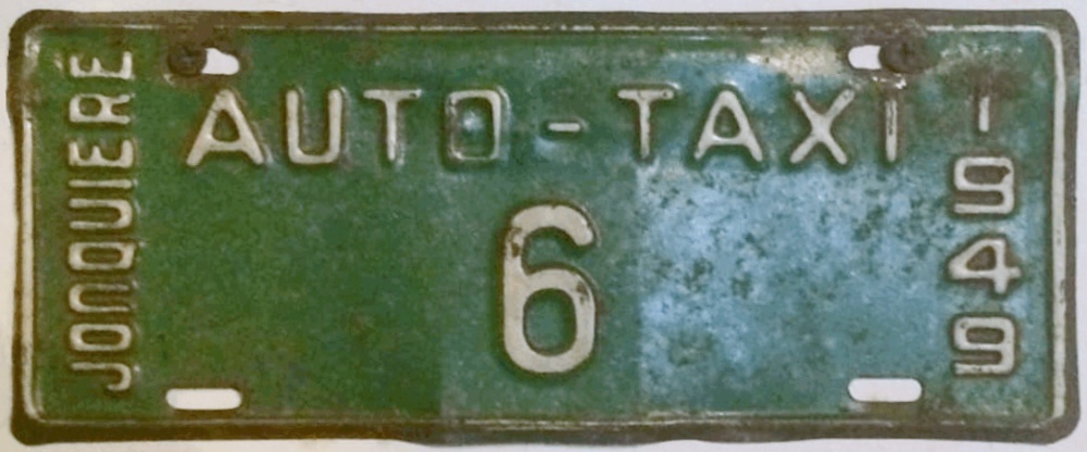 Plaque d'immatriculation TAXI Ville de Jonquière de 1949